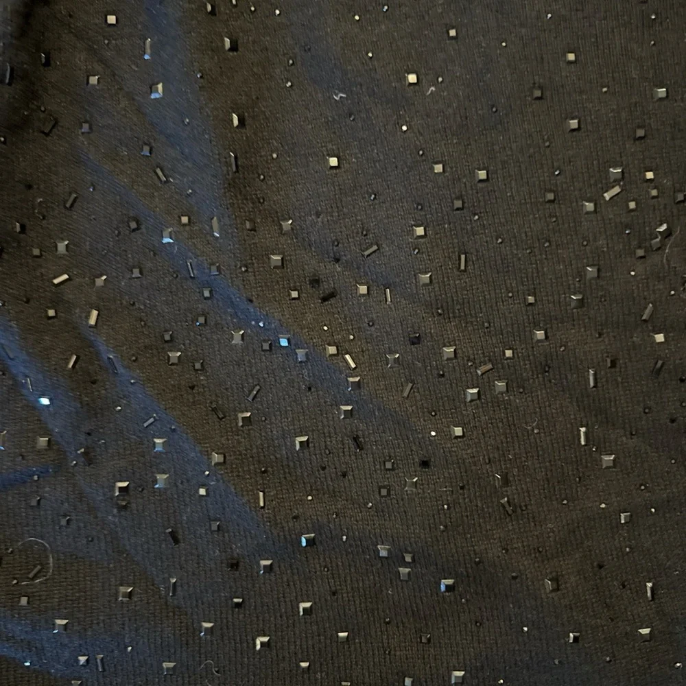 InCashmere Asymmetrical Rhinestone Drape Topper in Black